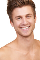 Obraz premium Skincare, man and portrait with smile in studio for facial, treatment and wellness aesthetic in morning. Grooming, face and person with haircare routine, cosmetic and hygiene on white background