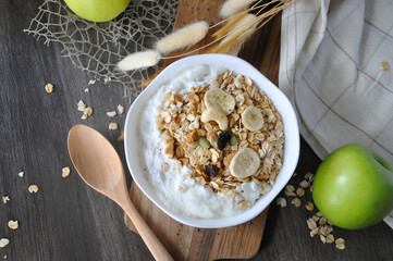 Top view of Yogurt Bowl Topping with Granola and Grain