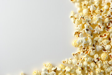 Popcorn. Popcorn scattered throughout the space. A cardboard box. A cloth bag. Space for text. Popcorn Day. January 19. 2024. Popcorn border isolated on white