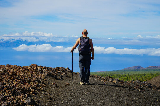 Hiker on the top of Teide mountain, Tenerife, Canaries, Spain
