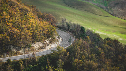 Mountain road making a curve in the countryside