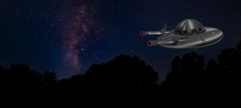 UFO with two guns over a forest