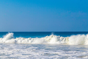 Extremely huge big surfer waves at beach Puerto Escondido Mexico.