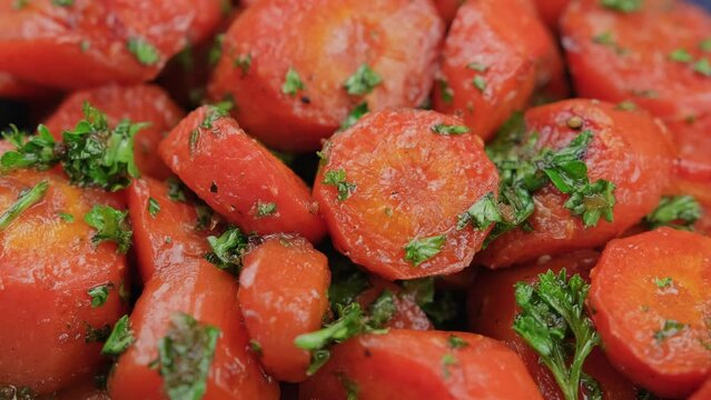 Oven baked Carrots with balsamic vinegar and garlic dressing. Rotating video