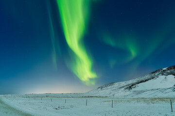 Aurora Borealis. Northern lights and starry skies. Nature. Scandinavian countries. Snow and ice on...