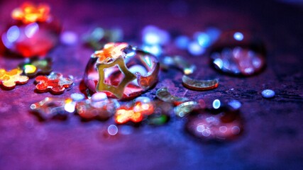 Drop of water background with glitter and glowing lights