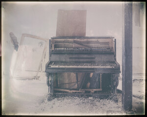 Lost place, vintage photograph of brocken piano in abandoned house