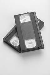 Two videotapes VHS on white background.