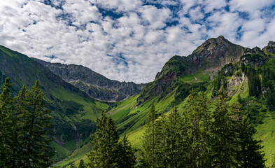 Fototapeta na wymiar Hike to the Hochkuenzelspitze in Vorarlberg Austria from Schroecken via the Biberacher Hut
