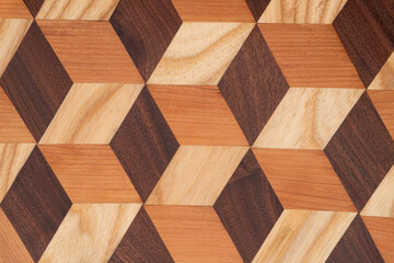 Blocks of oak wood stained and glued to create a geometrical pattern