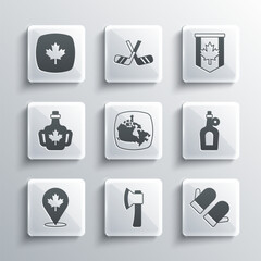 Set Wooden axe, Christmas mitten, Bottle of maple syrup, Canada, Canadian leaf, and Pennant flag icon. Vector