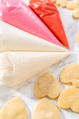 Heart-shaped sugar cookies with royal icing