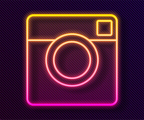 Glowing neon line Photo camera icon isolated on black background. Foto camera. Digital photography. Vector