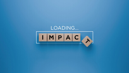 Wooden blocks spelling 'IMPACT' with a loading progress bar on a blue background, making difference concept
