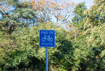 Close and selective focus on an end of cycle route sign in the countryside