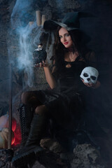 A portrait of a young sexy witch with outside. Magic, dark force, spell. Witchcraft. Halloween.