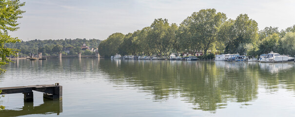boats moored at Neckar river bank near Hofen dam, Stuttgart, Germany - obrazy, fototapety, plakaty
