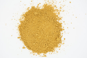 Turmeric powder isolated on a white background