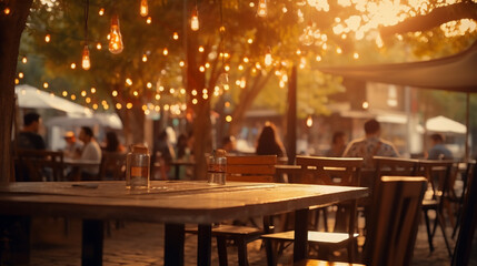 Fototapeta na wymiar a group of people, defocused, at a summer outdoor restaurant and bar, sunny warm lights and soft bokeh, during golden hour