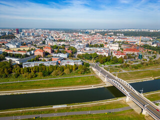 Aerial landscape of Warta river, Saint Roch's bridge and distant Old Market, Poznan - obrazy, fototapety, plakaty