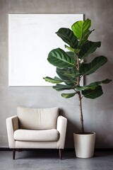 Vertical photo with copy space of an armchair, house plant and a big art in modern apartments. Part of the interior in a minimalist style against the background of a grey concrete wall.