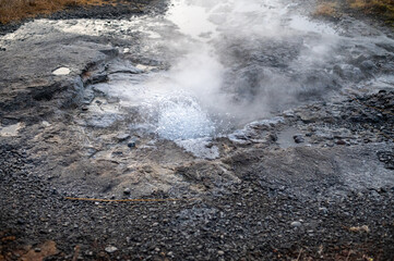 Mini geyser in Secret Lagoon, Iceland