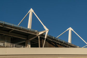 Obraz premium steel tie rods, restoration of the stadium roof with steel structures and tie rods, with steel tie rods and lever structure. constructive detail. Turin, Italy, 25 November 2023.