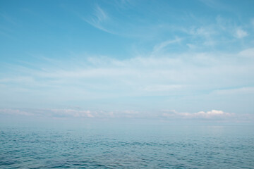 Blue ocean panorama, expansive scene with clear sky, ripple wave and calm sea with beautiful sunshine