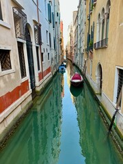Fototapeta na wymiar A quite canal in Venice, Italy