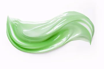 Fotobehang A smear of transparent, pure aloe lotion gel isolated on a white background, ideal for beauty and hygiene purposes. © ckybe