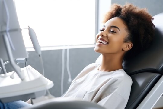 african american woman smiling happily while sitting in medical chair at dental clinic. AI Generated