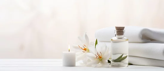 Foto op Canvas On a pristine white table, an assortment of flowers, isolated against a plain background, showcases the beauty of nature in a spa setting. The delicate white florals symbolize health and wellness © AkuAku