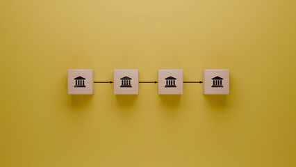 Branch expansion strategy, banking growth representation with wooden cubes on yellow background,...