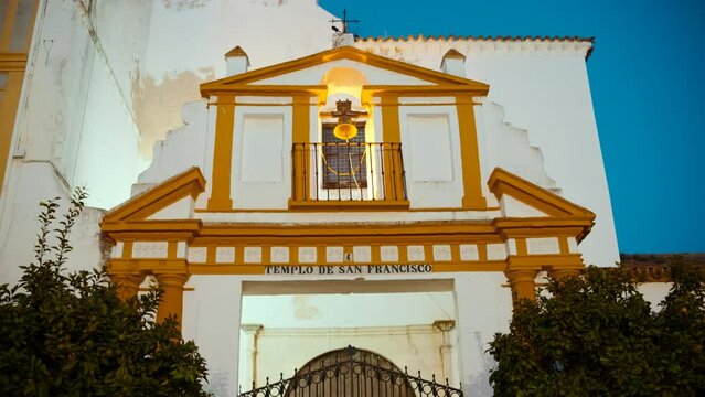 Night view of the Templo de San Francisco in Ayamonte, Huelva, Andalucia, Spain, bathes the historic structure in a serene, ambient glow