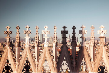 Marble patterns on the spires on the roof of the Duomo, the Cathedral of Milan city, in Italy,...