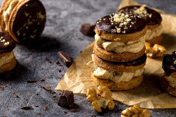 Round nut cookies with coffee and nut cream