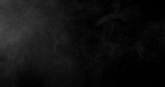Wide Dust Particles 2 1030 2K Real dust particles floating on black background. Slow motion 
