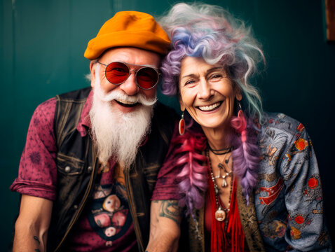 A bright and fashionable elderly couple of hipsters. The concept of eternal youth. The concept of a cheerful old age. 