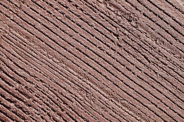 Brown Wall with Deep Lines in a Row Diagonally Scratched