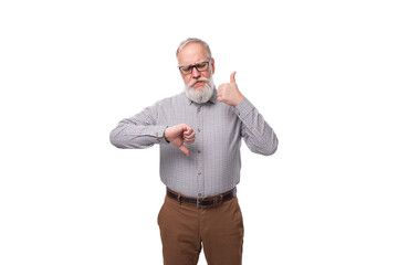 handsome elderly boss man with white beard and mustache dressed in shirt and pants