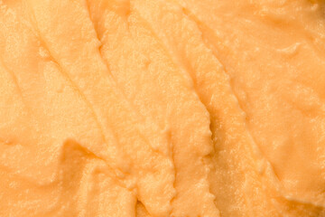 Fruit yogurt ice cream. Smoothies from fresh fruits and berries. Ice cream texture. Delicious sweet dessert close-up as a background.