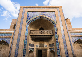 Facade of the Matniyaz Divanbegi Madrasah building in the ancient city of Khiva in Khorezm