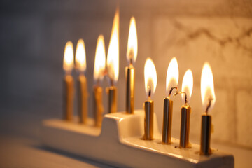 Chanukiah with burning candles. Concept of the Jewish holiday Hanukkah.