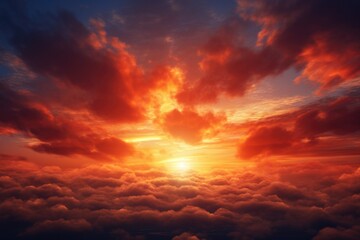 A picturesque view of the sun setting over the clouds in the sky. This stunning image captures the beauty and tranquility of a sunset. Perfect for a variety of projects and designs