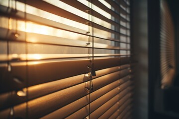 A close-up view of a window with blinds. This image can be used to depict privacy, interior design, or home decor