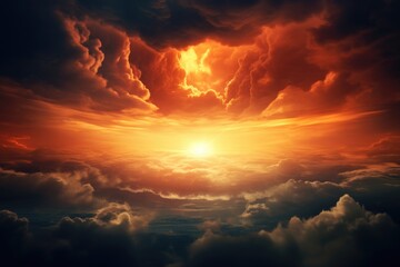 Fototapeta premium A beautiful image capturing the setting sun as it casts a warm glow over the clouds. Perfect for adding a serene and peaceful touch to any project