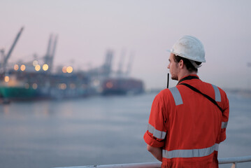 Offshore Project Manager Technician. Seafarer. Seaman. Navigator. A Man In A Boiler Suit Is...