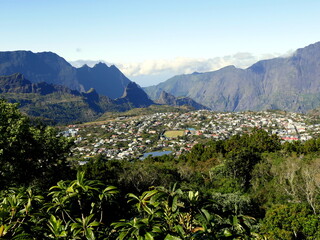 View of Cilaos town and circus from Roche Merveilleuse viewpoint, la R&eacute;union. Aerial view above the village surrounded by mountain landscape. 