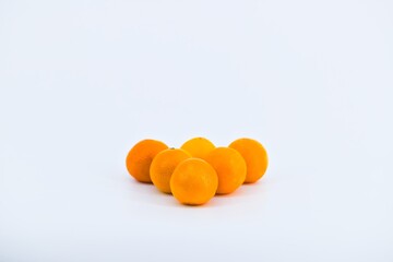 A vibrant image showcasing mandarins on a white background.