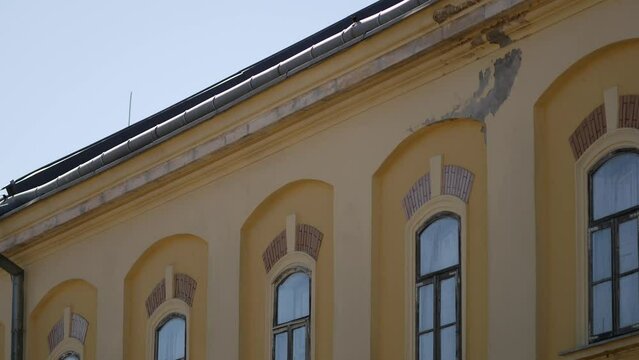 Roof of a house with lightning rods. Warm sunny day.  Rovinj, Croatia - February 13, 2023